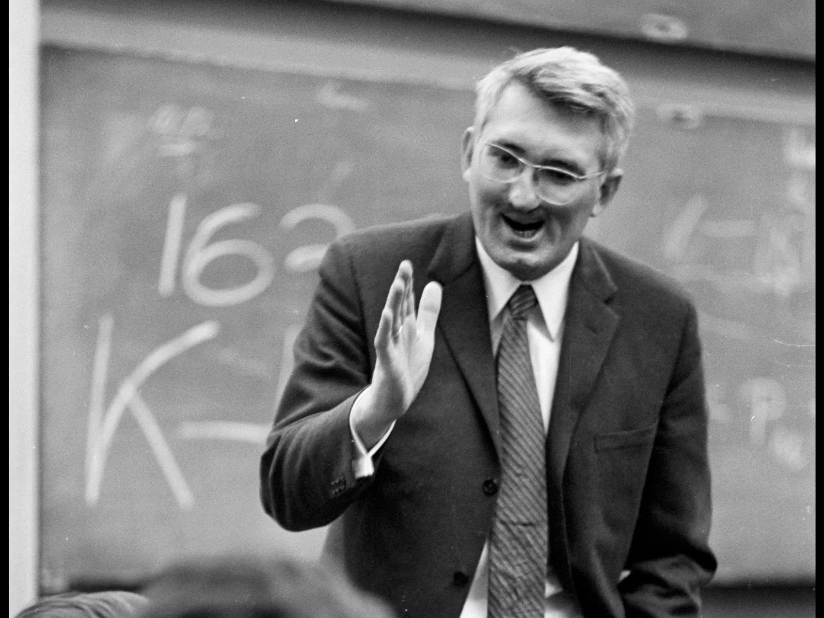 A young Jürgen Habermas lecturing at a chalkboard
